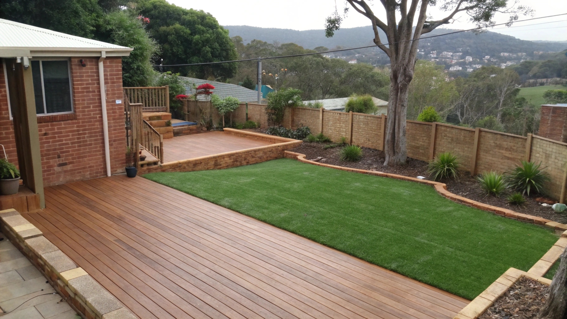 Escarpment-view backyard artificial turf installation overlooking the Illawarra suburbs