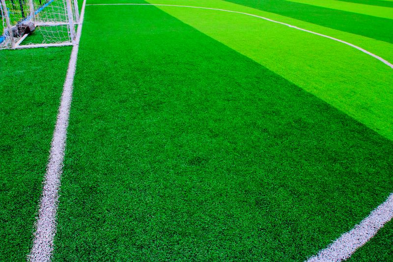 Sports field fitted with synthetic grass