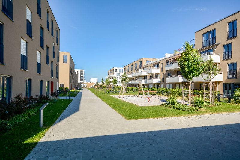synthetic grass lawn near apartments