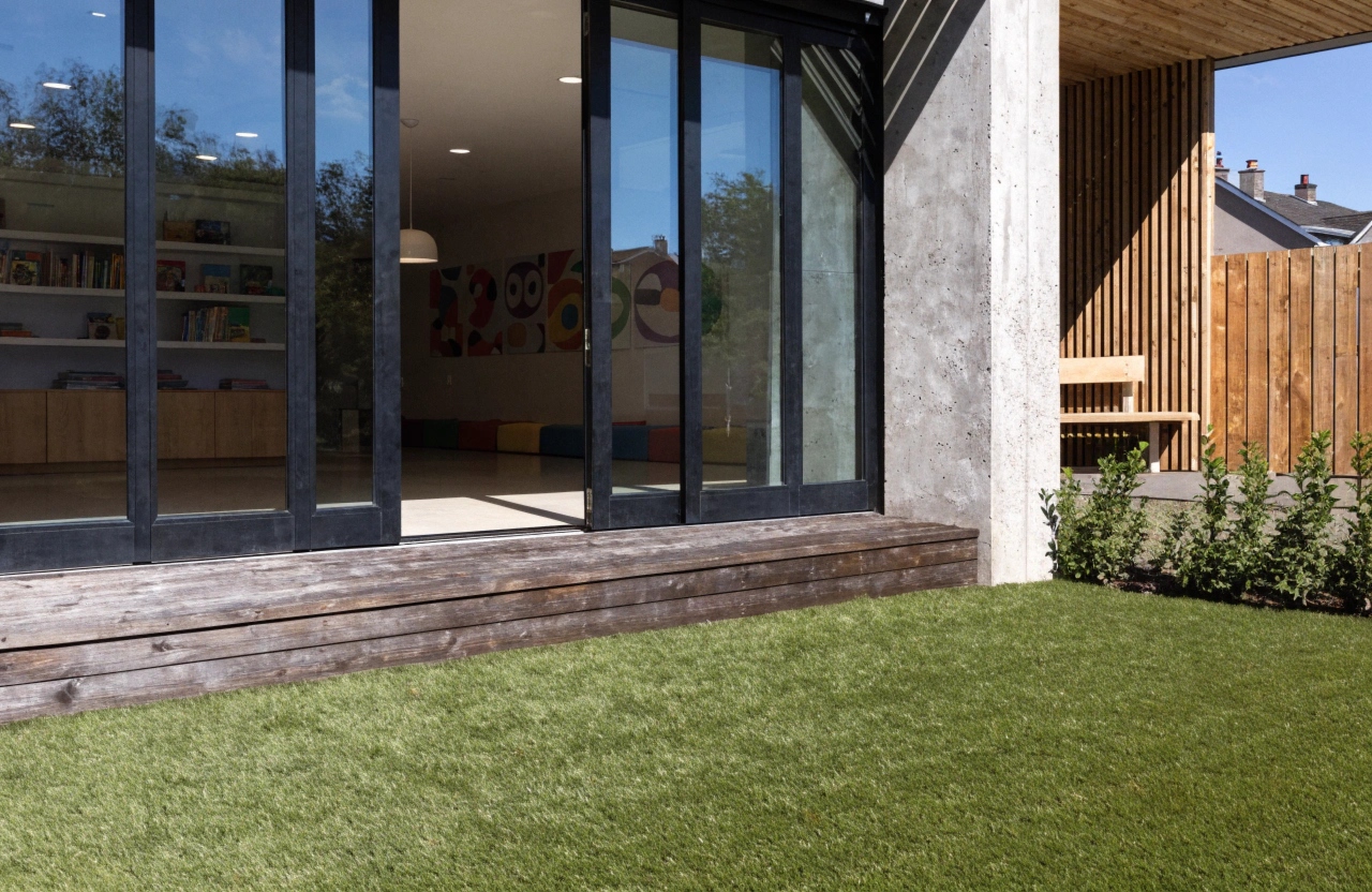 Clean synthetic turf surface at the indoor-outdoor transition area of an Illawarra childcare centre