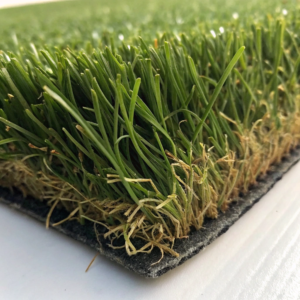 Close-up of thick cushioned playground synthetic grass pile showing soft fall construction