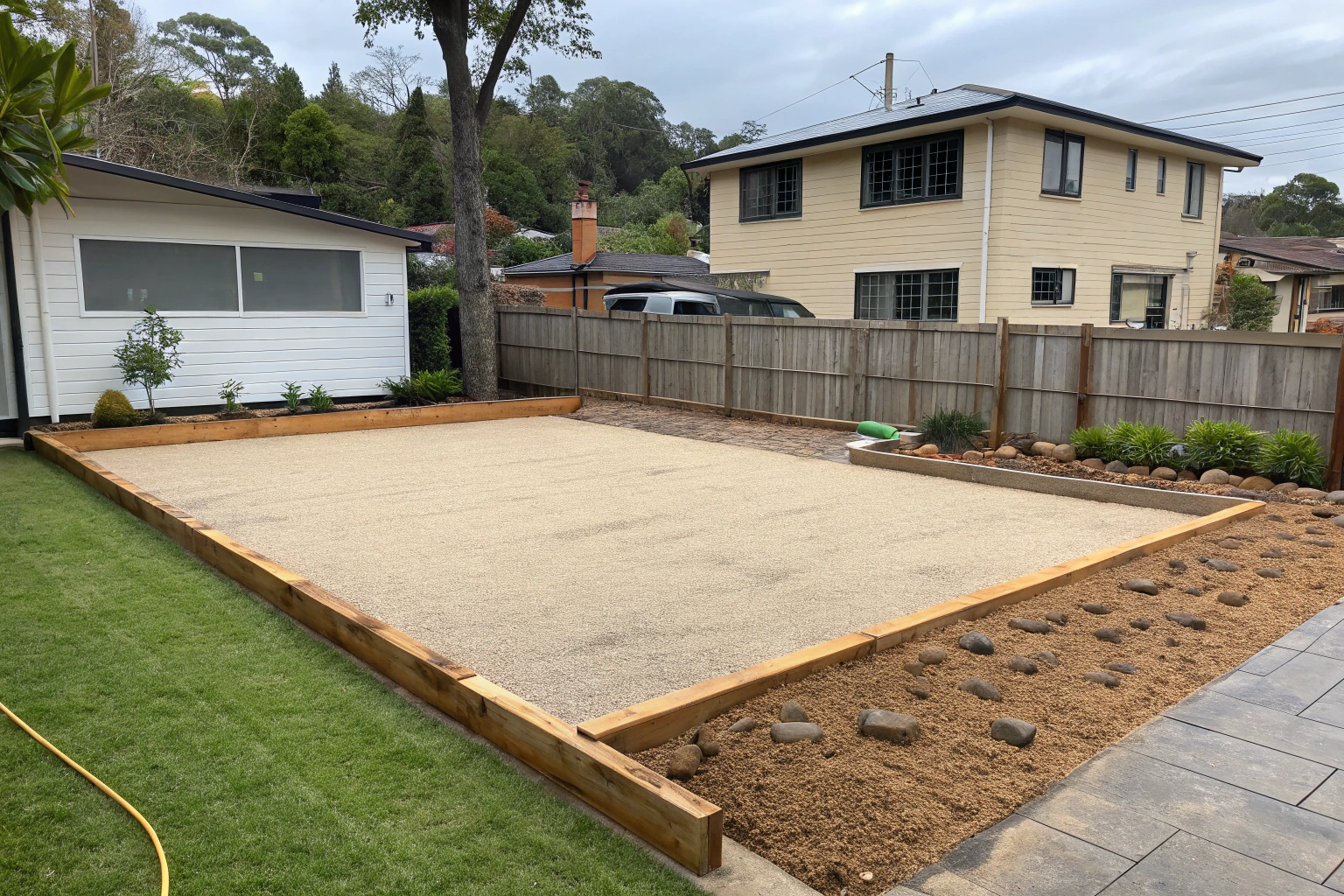 Sub-base assessment and compaction during removal of an old synthetic grass installation